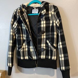 Delia’s plaid jacket